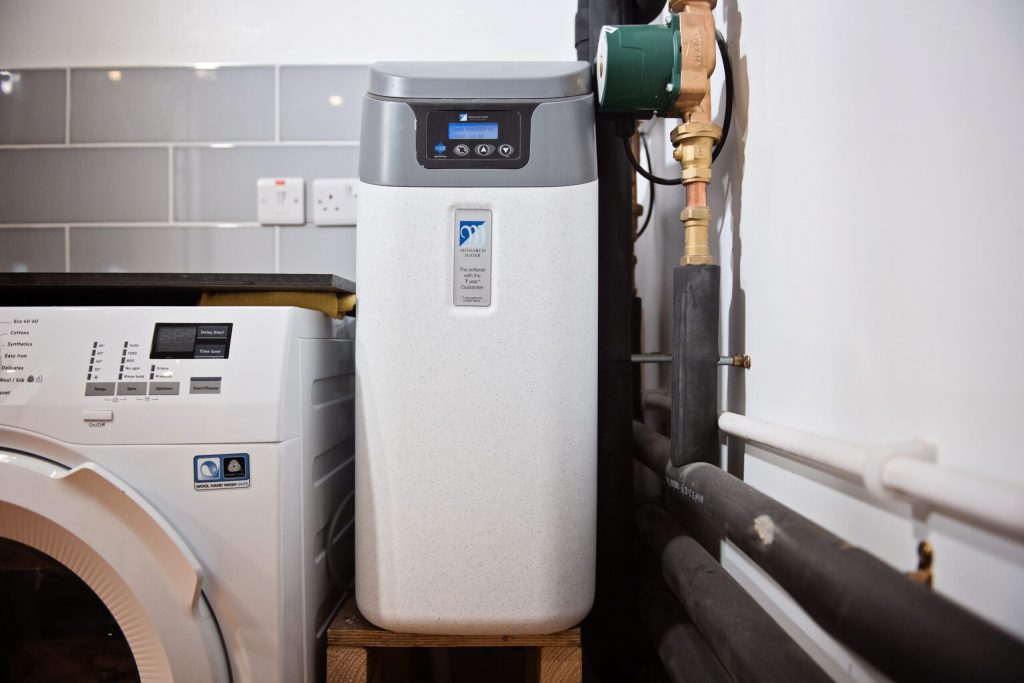 Stiebel Eltron indoor unit and hot water cylinder in a utility room