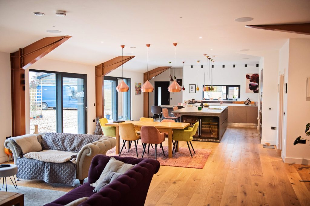 Open-plan living and dining room in a renovated home