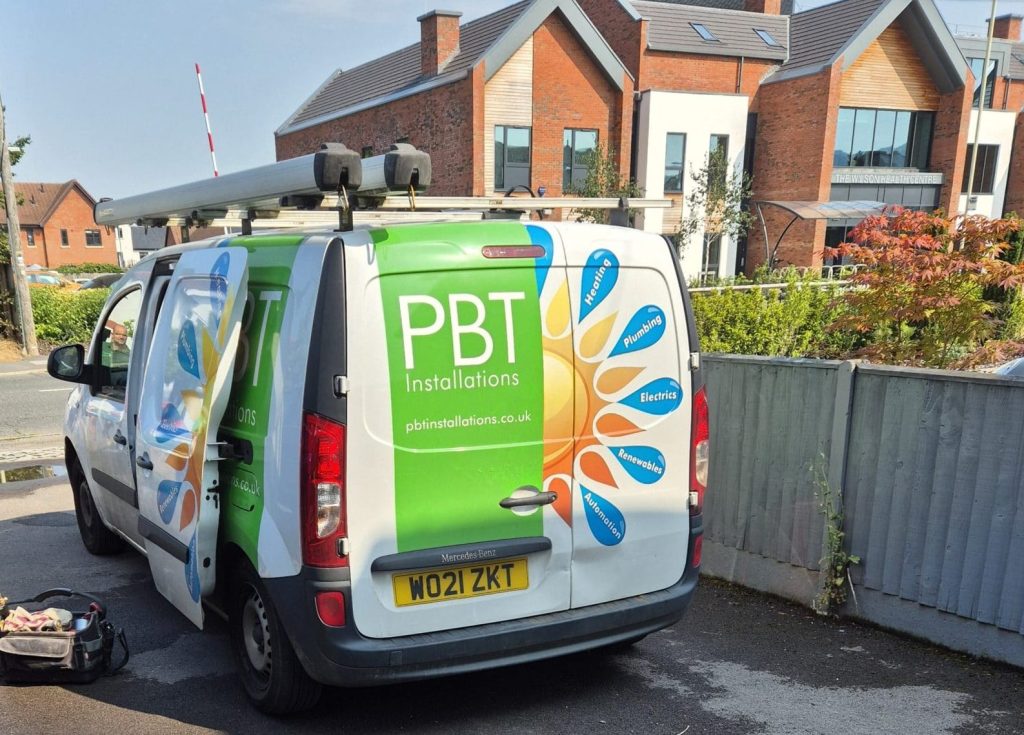 PBT Installations van parked on a residential street